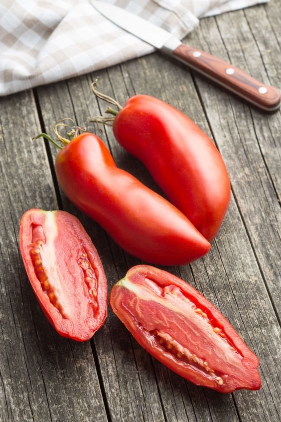 Sliced San Marzano Tomatoes on table